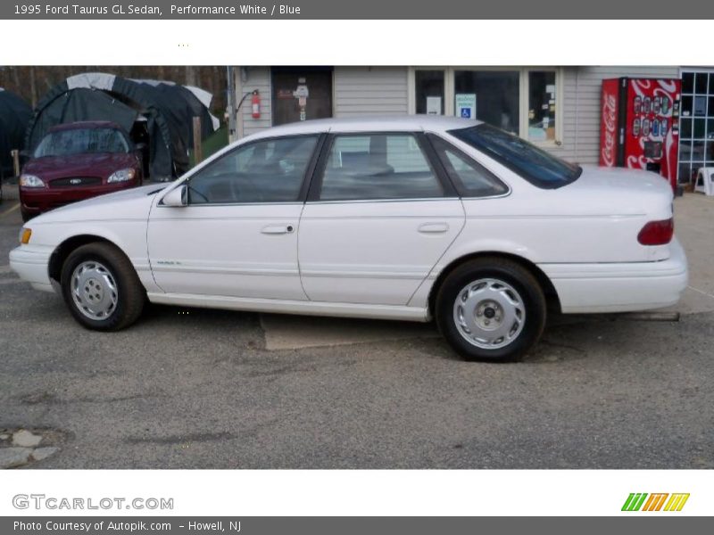 Performance White / Blue 1995 Ford Taurus GL Sedan