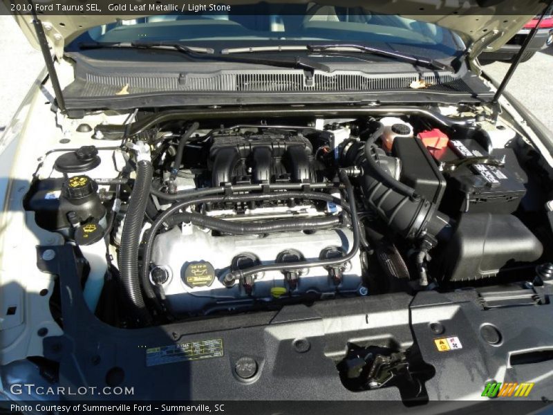 Gold Leaf Metallic / Light Stone 2010 Ford Taurus SEL