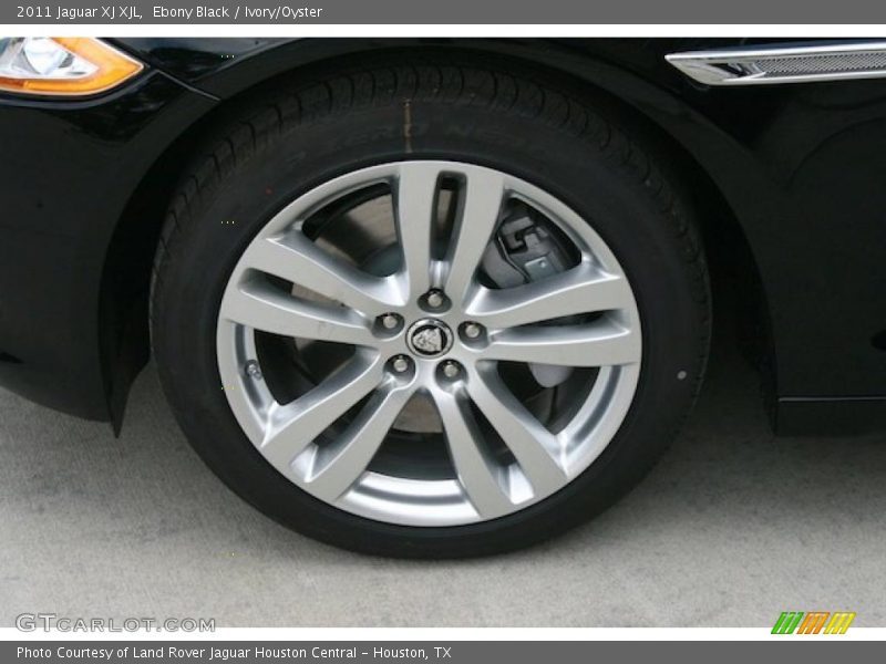 Ebony Black / Ivory/Oyster 2011 Jaguar XJ XJL