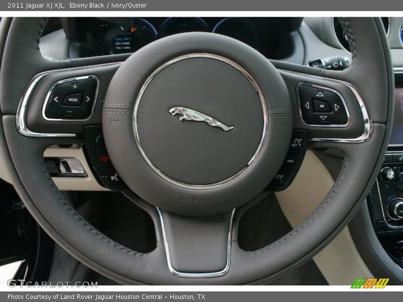 Ebony Black / Ivory/Oyster 2011 Jaguar XJ XJL