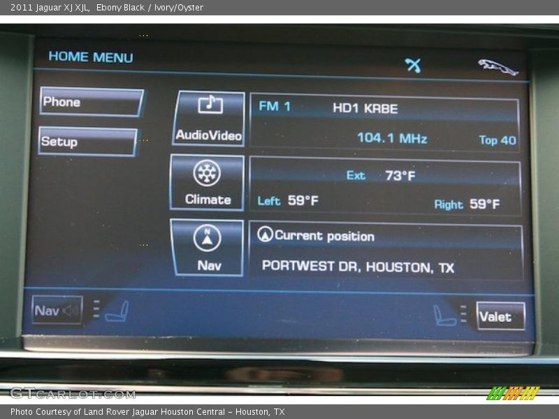 Ebony Black / Ivory/Oyster 2011 Jaguar XJ XJL