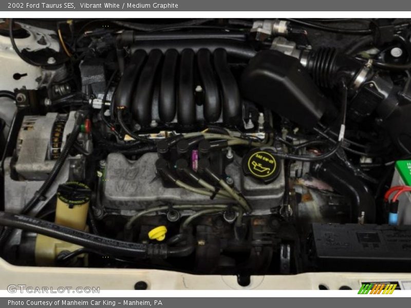 Vibrant White / Medium Graphite 2002 Ford Taurus SES