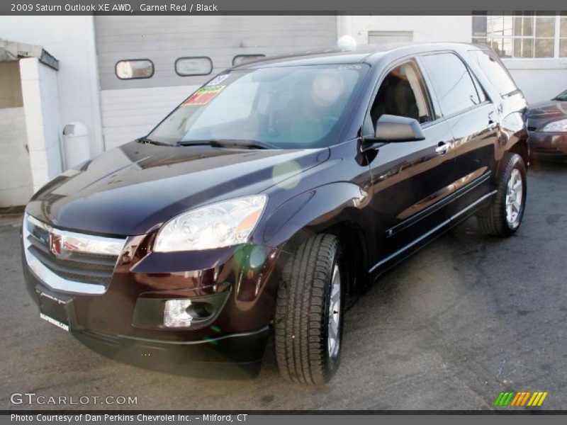 Garnet Red / Black 2009 Saturn Outlook XE AWD