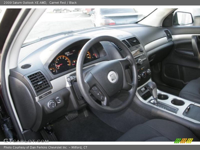 Garnet Red / Black 2009 Saturn Outlook XE AWD