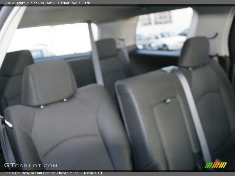 Garnet Red / Black 2009 Saturn Outlook XE AWD