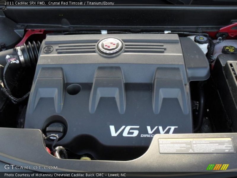 Crystal Red Tintcoat / Titanium/Ebony 2011 Cadillac SRX FWD