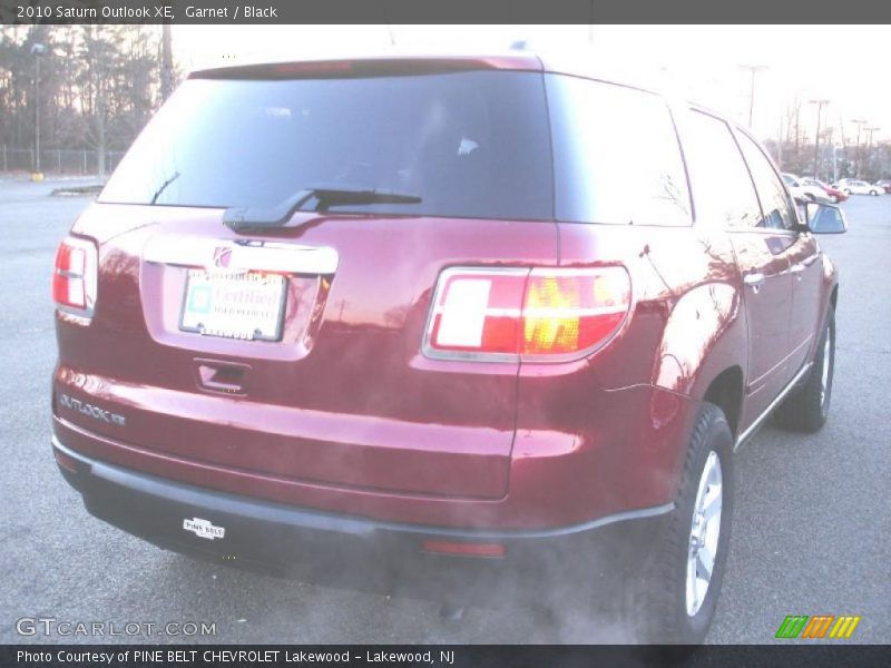 Garnet / Black 2010 Saturn Outlook XE
