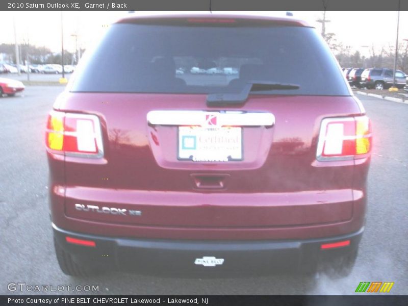 Garnet / Black 2010 Saturn Outlook XE