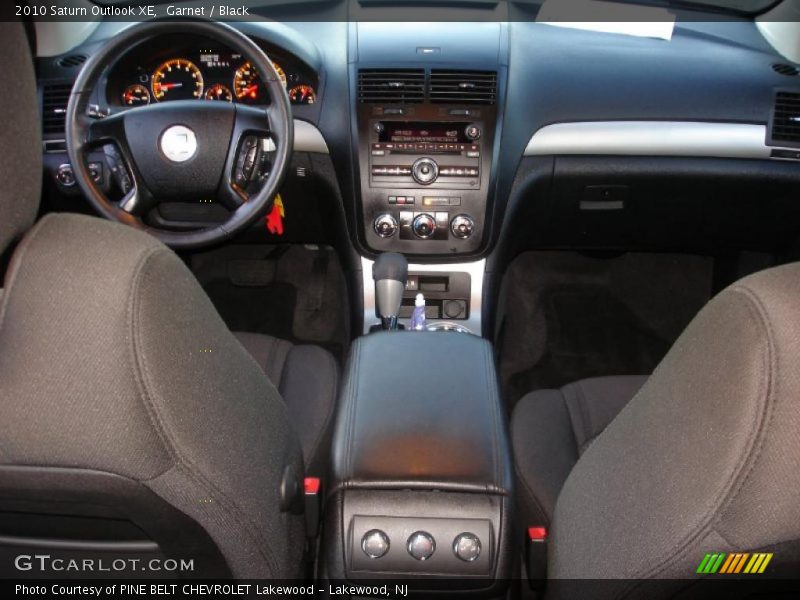 Garnet / Black 2010 Saturn Outlook XE