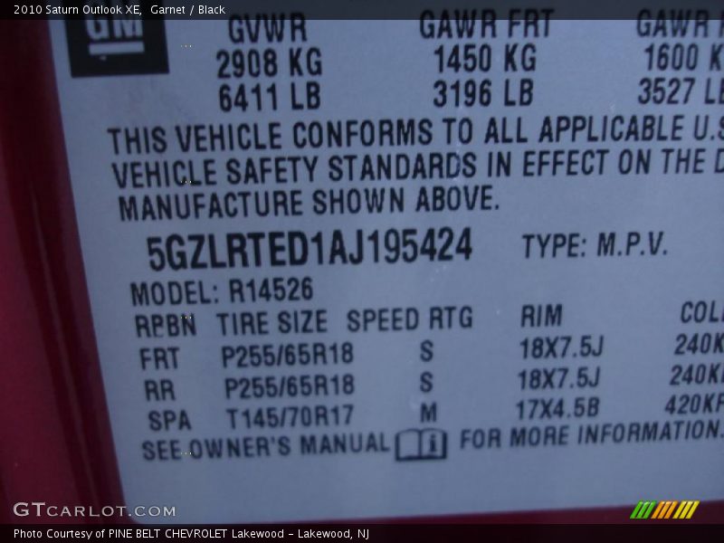 Garnet / Black 2010 Saturn Outlook XE