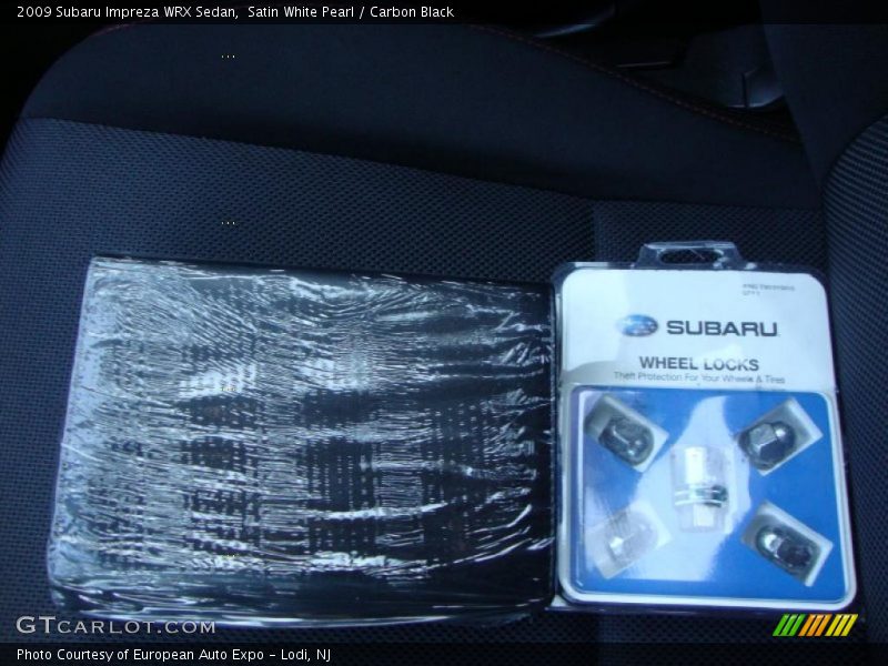 Satin White Pearl / Carbon Black 2009 Subaru Impreza WRX Sedan