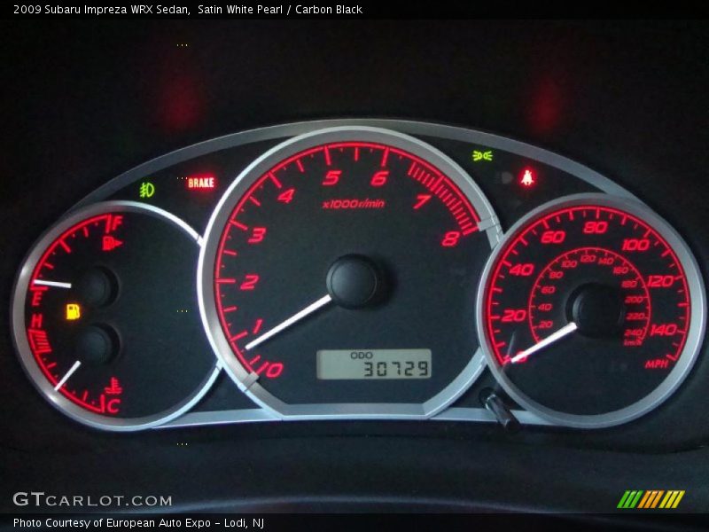 Satin White Pearl / Carbon Black 2009 Subaru Impreza WRX Sedan