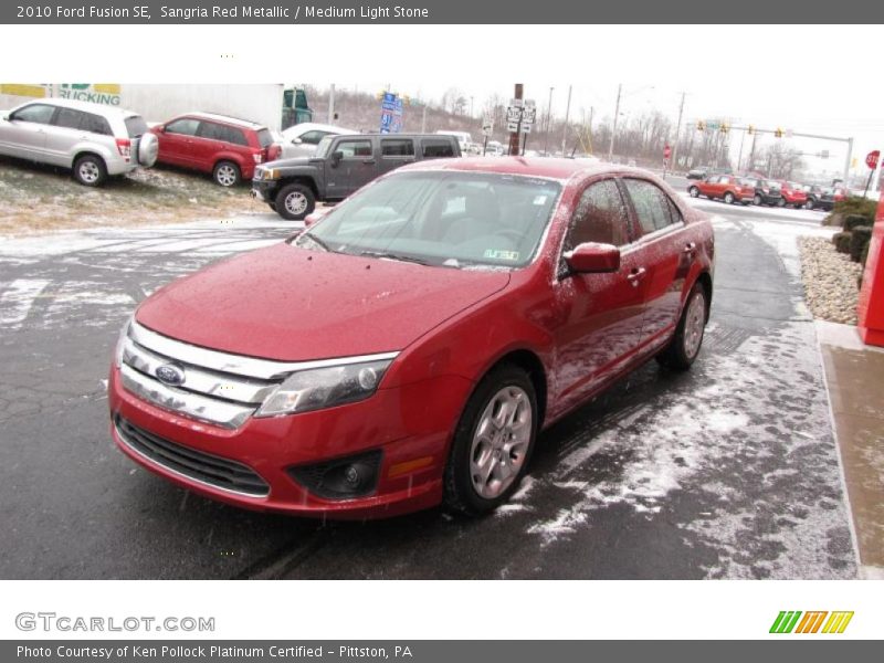 Sangria Red Metallic / Medium Light Stone 2010 Ford Fusion SE