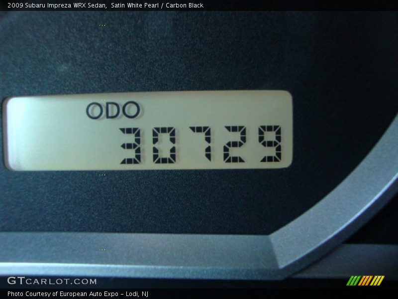 Satin White Pearl / Carbon Black 2009 Subaru Impreza WRX Sedan