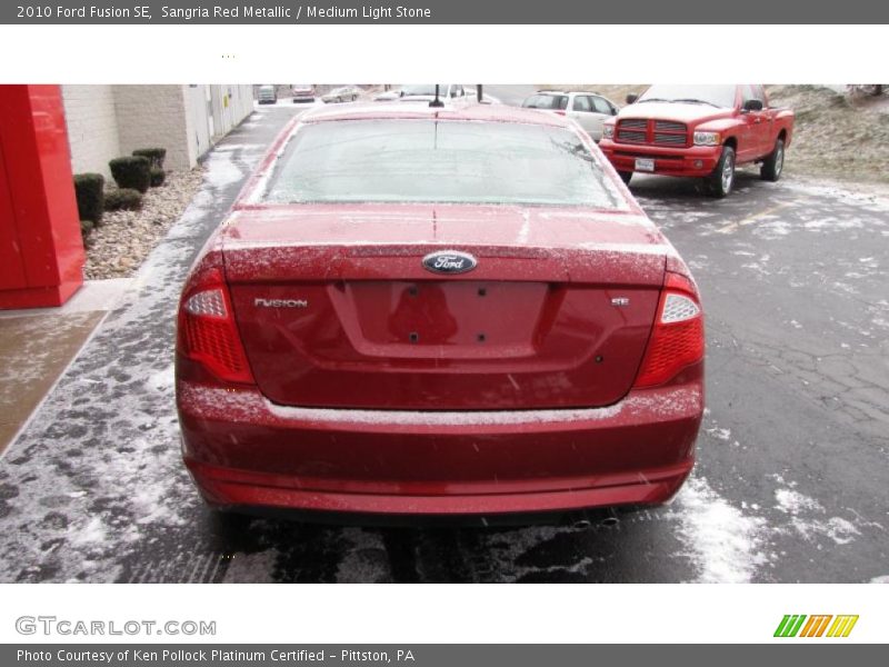 Sangria Red Metallic / Medium Light Stone 2010 Ford Fusion SE