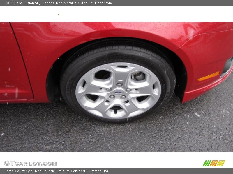 Sangria Red Metallic / Medium Light Stone 2010 Ford Fusion SE