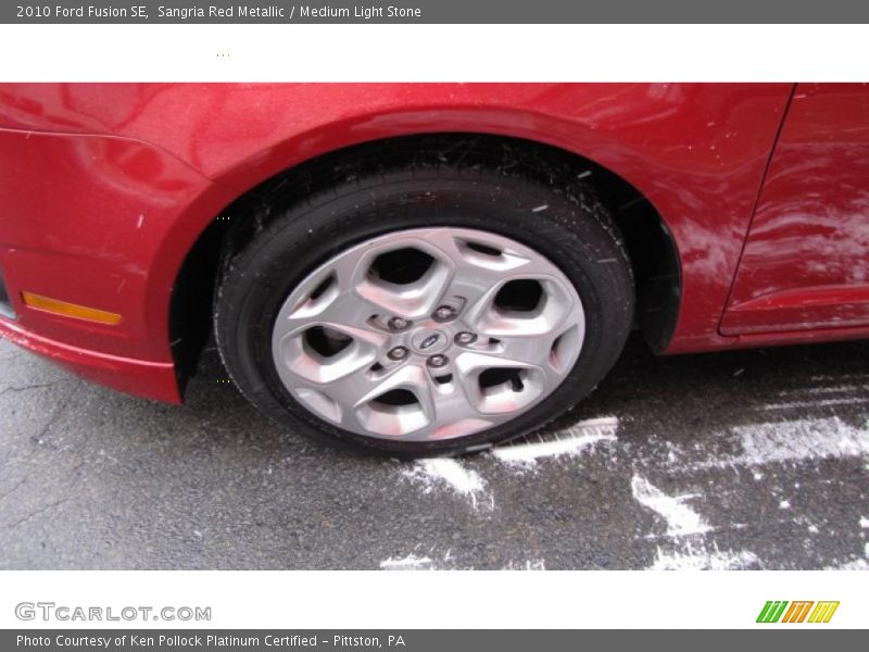 Sangria Red Metallic / Medium Light Stone 2010 Ford Fusion SE