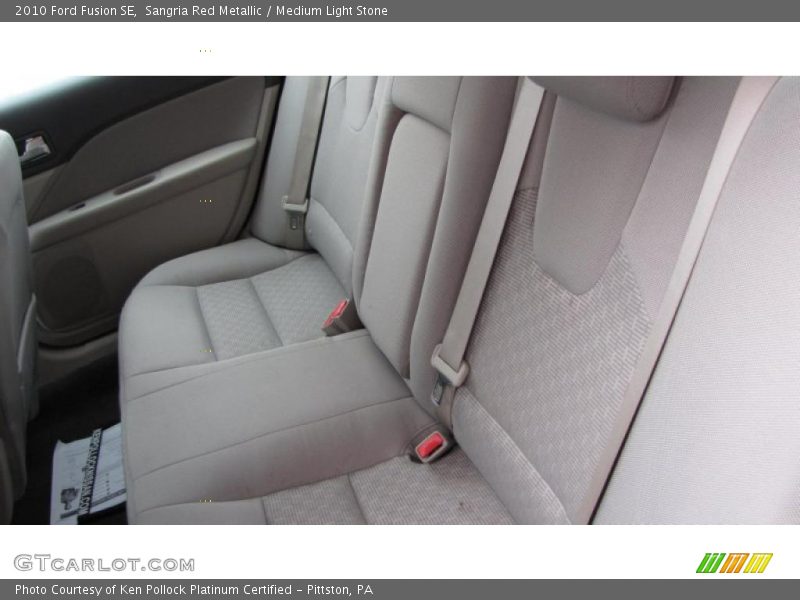 Sangria Red Metallic / Medium Light Stone 2010 Ford Fusion SE