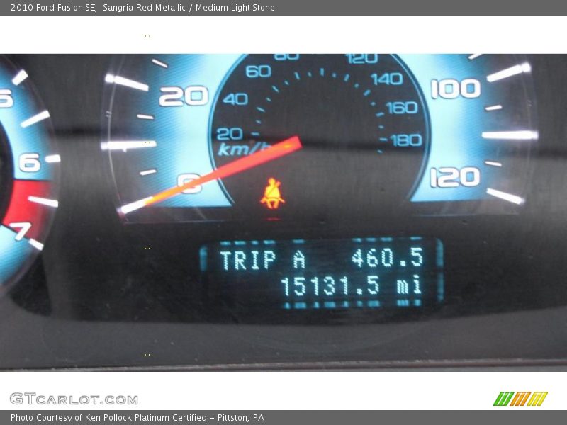 Sangria Red Metallic / Medium Light Stone 2010 Ford Fusion SE