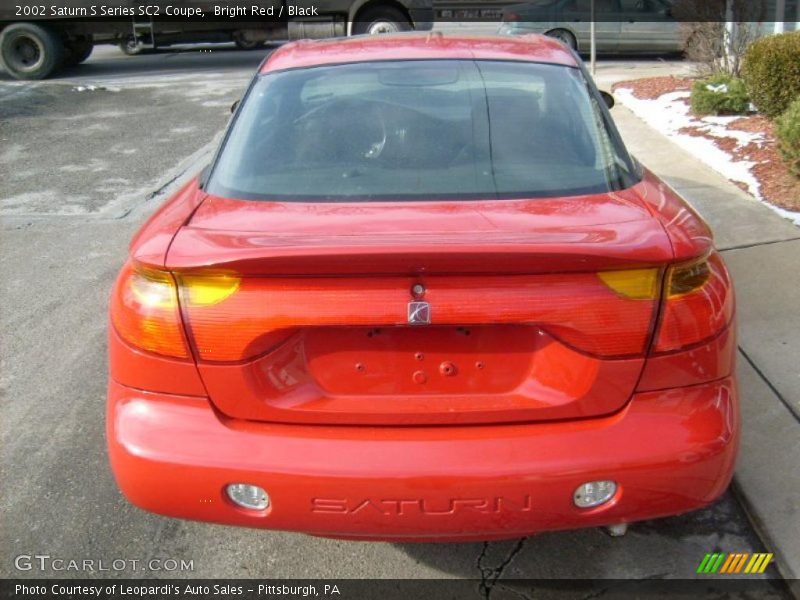 Bright Red / Black 2002 Saturn S Series SC2 Coupe