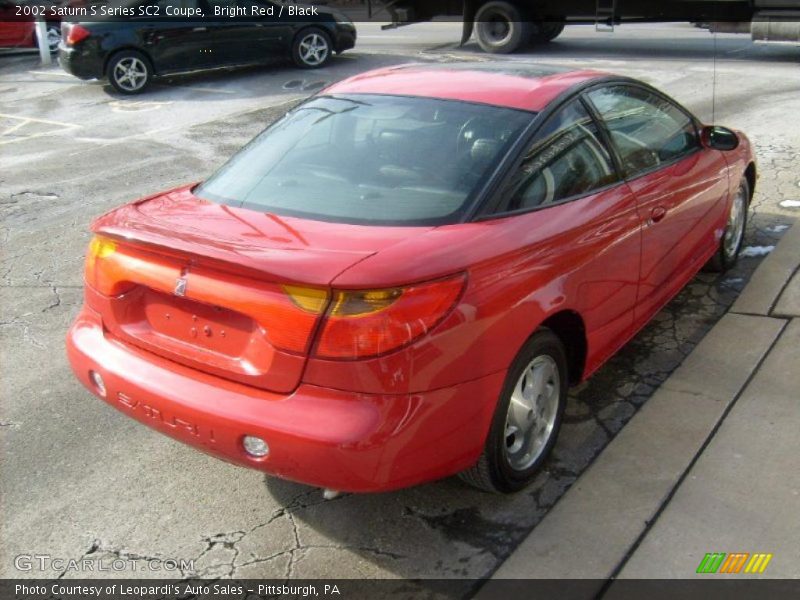 Bright Red / Black 2002 Saturn S Series SC2 Coupe