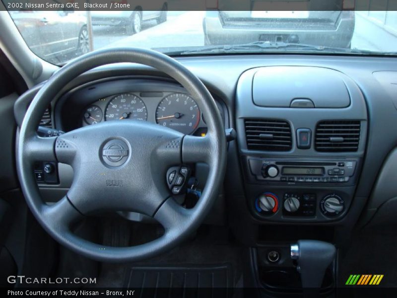 Blackout / Stone 2002 Nissan Sentra GXE