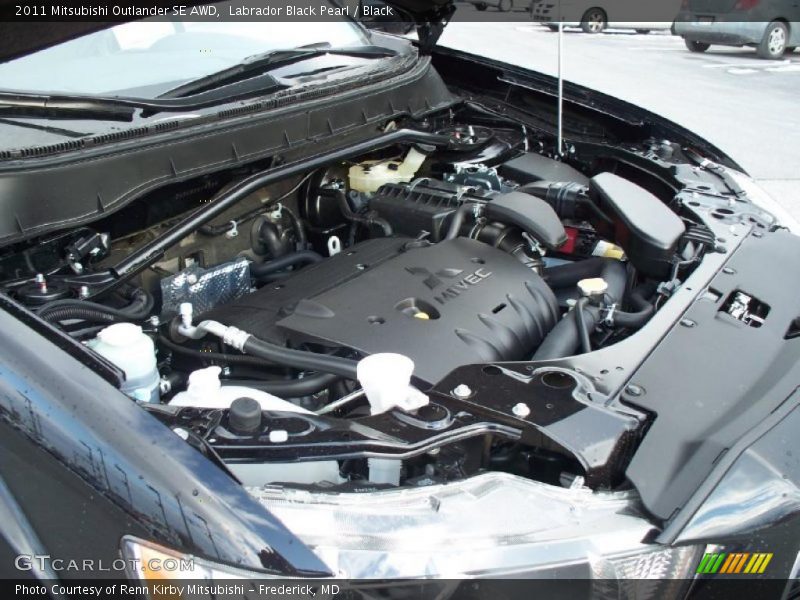 Labrador Black Pearl / Black 2011 Mitsubishi Outlander SE AWD