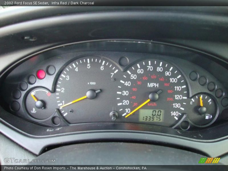 Infra Red / Dark Charcoal 2002 Ford Focus SE Sedan