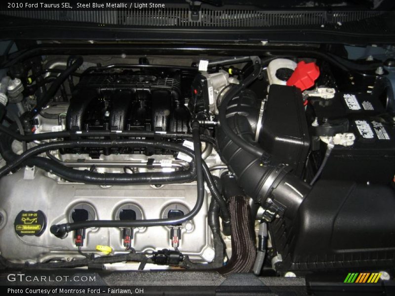 Steel Blue Metallic / Light Stone 2010 Ford Taurus SEL