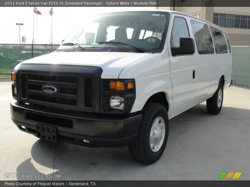 Front 3/4 View of 2011 E Series Van E350 XL Extended Passenger