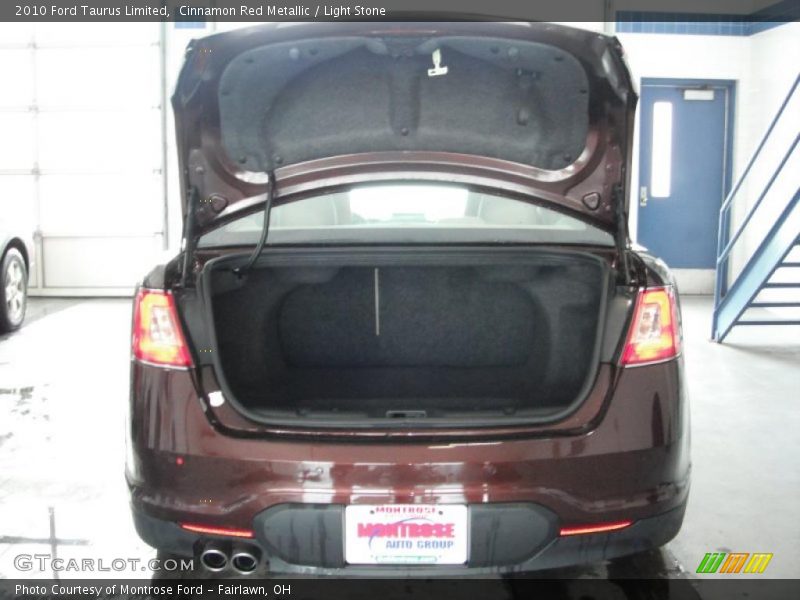 Cinnamon Red Metallic / Light Stone 2010 Ford Taurus Limited