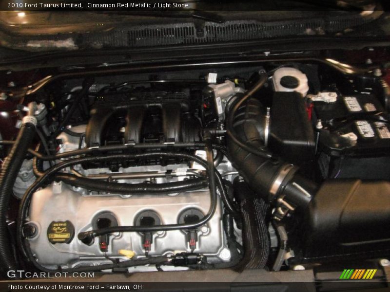 Cinnamon Red Metallic / Light Stone 2010 Ford Taurus Limited