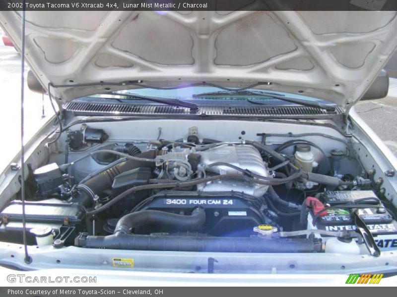 Lunar Mist Metallic / Charcoal 2002 Toyota Tacoma V6 Xtracab 4x4