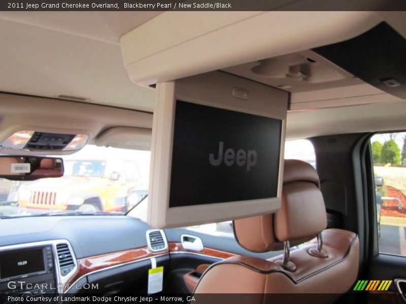  2011 Grand Cherokee Overland New Saddle/Black Interior