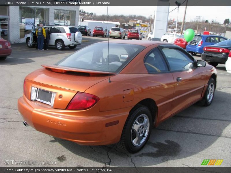 Fusion Orange Metallic / Graphite 2004 Pontiac Sunfire Coupe