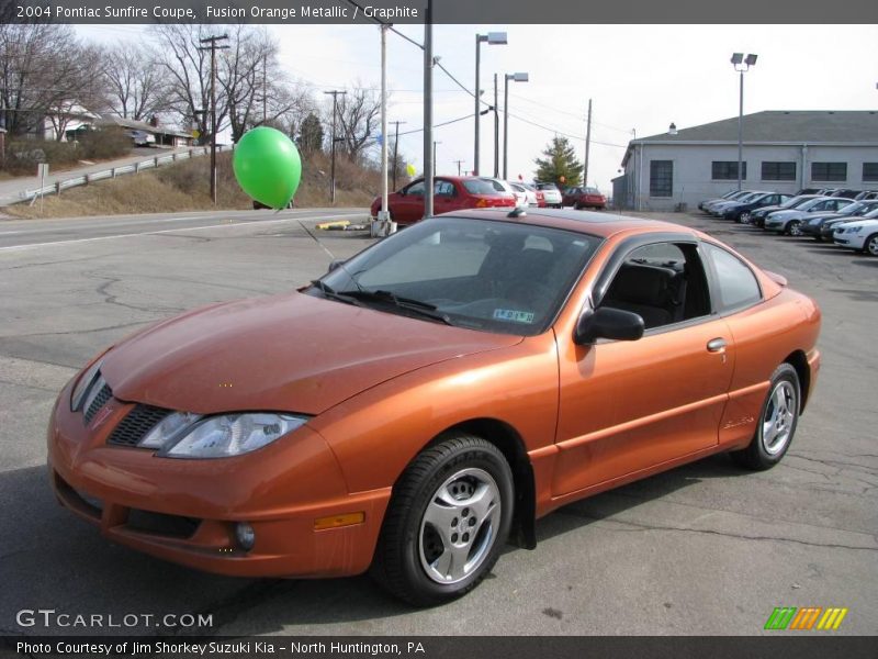 Fusion Orange Metallic / Graphite 2004 Pontiac Sunfire Coupe