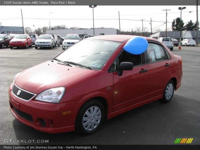 Racy Red / Black 2006 Suzuki Aerio AWD Sedan