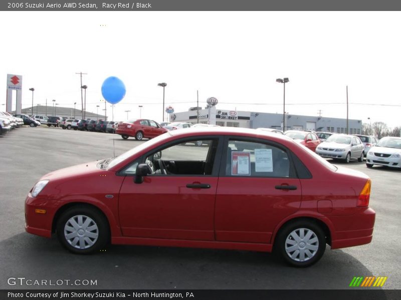 Racy Red / Black 2006 Suzuki Aerio AWD Sedan