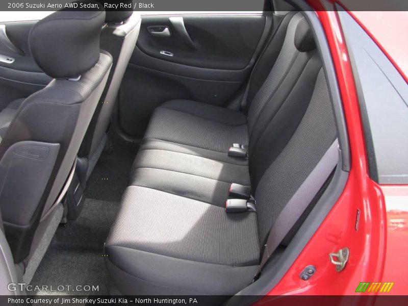 Racy Red / Black 2006 Suzuki Aerio AWD Sedan