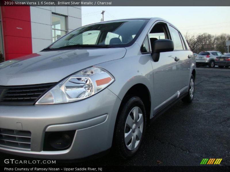 Brilliant Silver Metallic / Charcoal 2010 Nissan Versa 1.6 Sedan