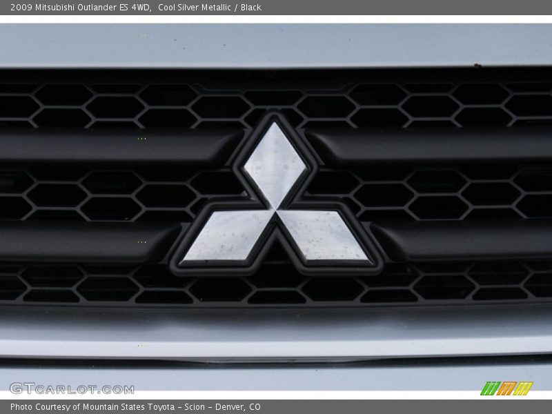  2009 Outlander ES 4WD Logo