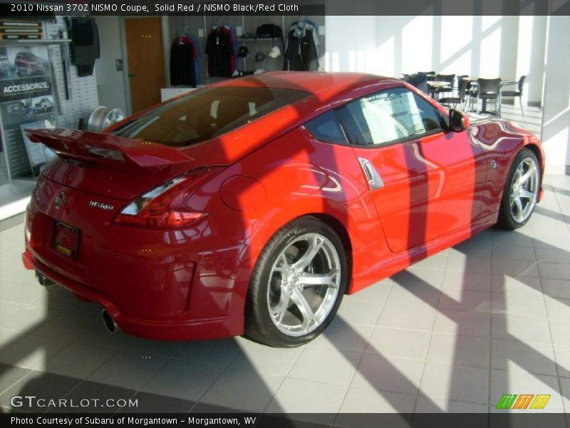 Solid Red / NISMO Black/Red Cloth 2010 Nissan 370Z NISMO Coupe