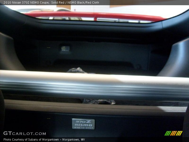 Solid Red / NISMO Black/Red Cloth 2010 Nissan 370Z NISMO Coupe