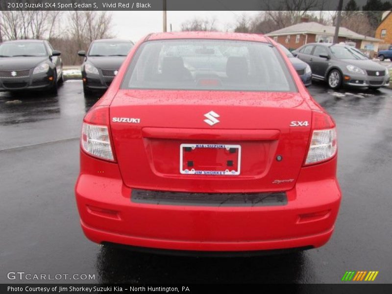 Vivid Red / Black 2010 Suzuki SX4 Sport Sedan S