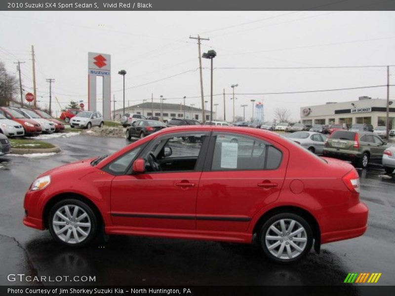 Vivid Red / Black 2010 Suzuki SX4 Sport Sedan S
