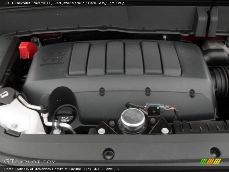 Red Jewel Metallic / Dark Gray/Light Gray 2011 Chevrolet Traverse LT