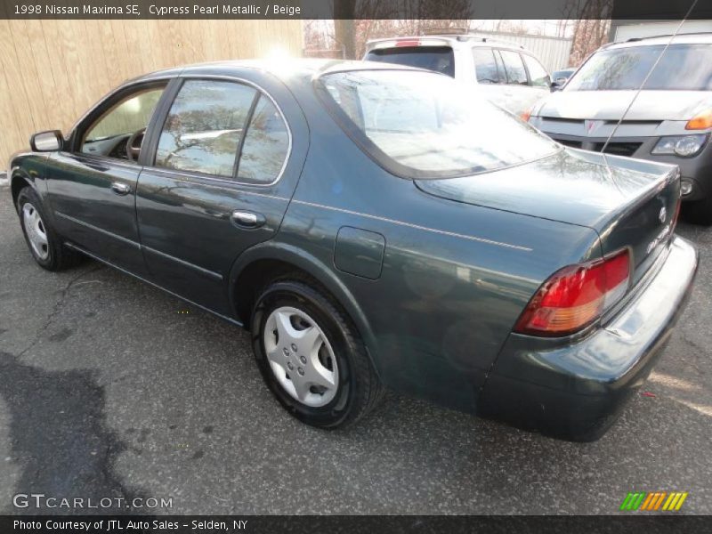 Cypress Pearl Metallic / Beige 1998 Nissan Maxima SE