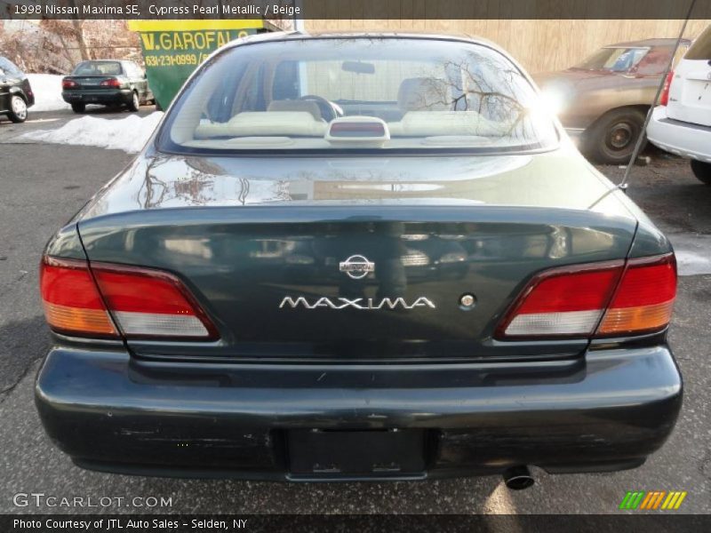 Cypress Pearl Metallic / Beige 1998 Nissan Maxima SE
