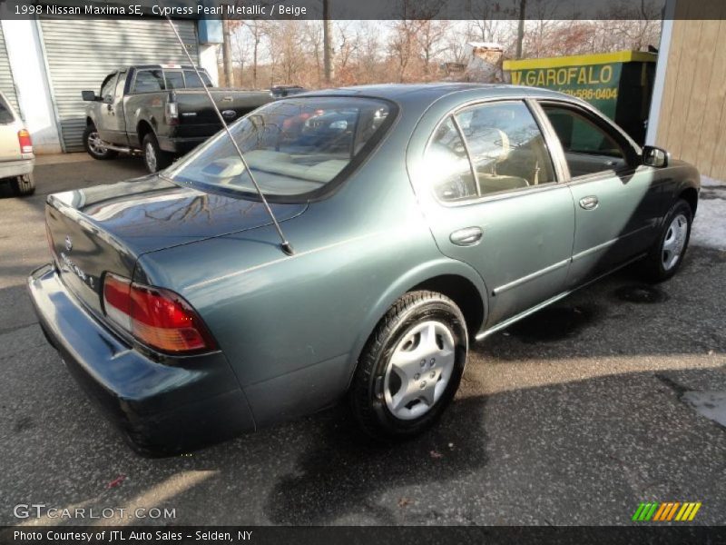 Cypress Pearl Metallic / Beige 1998 Nissan Maxima SE