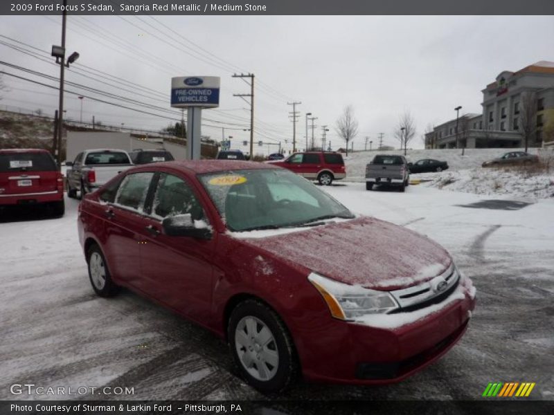 Sangria Red Metallic / Medium Stone 2009 Ford Focus S Sedan